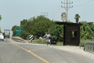 Lots of people hitch hike from the bus stops, not wanting to wait. 